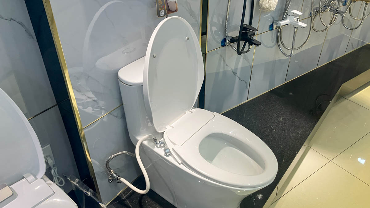 Nắp bồn cầu rửa cơ Caesar TAF060